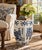 A classic blue and white porcelain garden stool, decorated with traditional Chinese motifs and stylized floral elements....