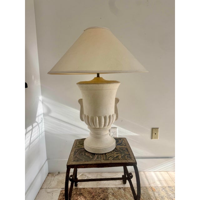 Pair of vintage Bon Art table lamps, dated 1989, with ivory plaster urn-form bodies and subtle faux veining throughout....