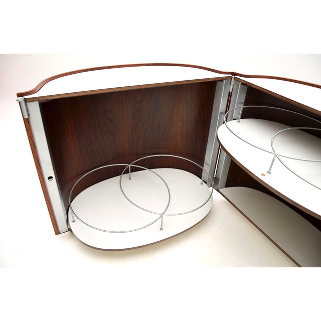 A very stylish and extremely rare vintage Italian drinks cabinet by Eugenio Gerli for Tecno. It was made in Italy, and...