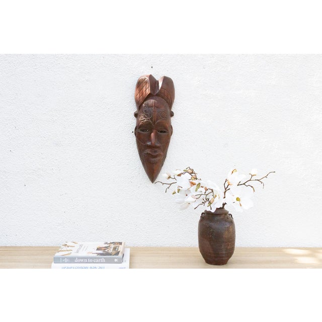 This charming Kwele mask from Gabon or the Republic of Congo is a delightful example of African tribal art. The mask is...