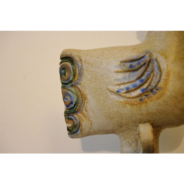 Rare ceramic lamp, dated and located in Rozerielles, 1979. An original zoomorphic piece with a characteristic textured...