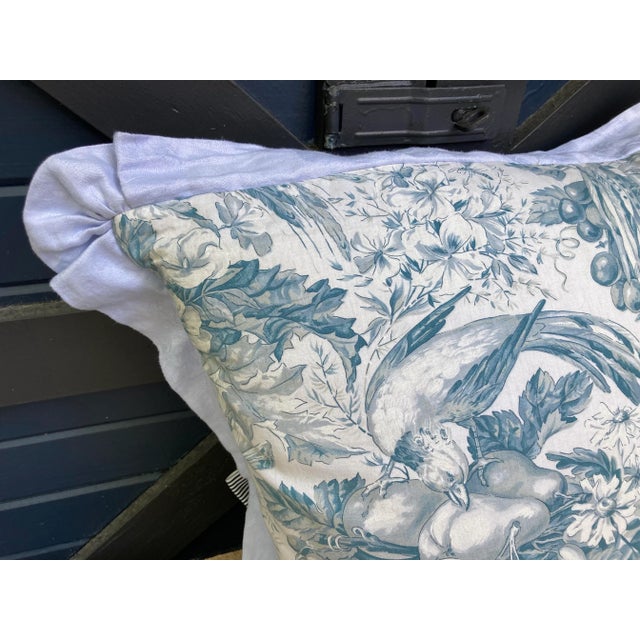 A made from a circa the 1940s printed cotton depicting a basket of fruit, flowers and birds. Backed and edged with hand-...