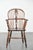 We are offering this lovely antique English low-back Windsor chair with a beautiful patina and exquisite details. This...