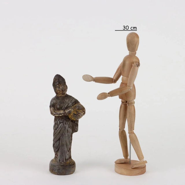 Terracotta statue decorated in polychrome. This piece is attributed to the mentioned designer/maker. It has no attribution...