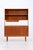 Vintage shelving unit with a chest of drawers and a teak shelf above. The lower section features two doors and four large...