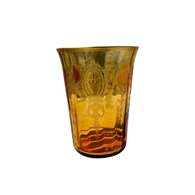 12 Beautiful Amber Glass with engraved design and gold rim.