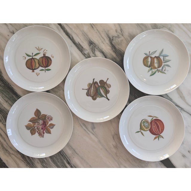 Here is a set of fine white porcelain salad or dessert plates, made and decorated in Spain. A contemporary brightly...