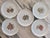 Here is a set of fine white porcelain salad or dessert plates, made and decorated in Spain. A contemporary brightly...