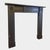 An early 19th century Irish Bangor Slate Antique Regency fireplace. The jambs with shaped moulded panels, separate foot...