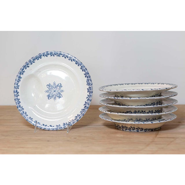 Six Terre de Fer blue and white asparagus plates from the 19th century, with foliage and fruit decor, priced and sold...