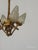 Offered for your consideration is an Antique Darling 4 Arm 4 Light Glowing Ribbons and bows Flame Torch Chandelier. The...
