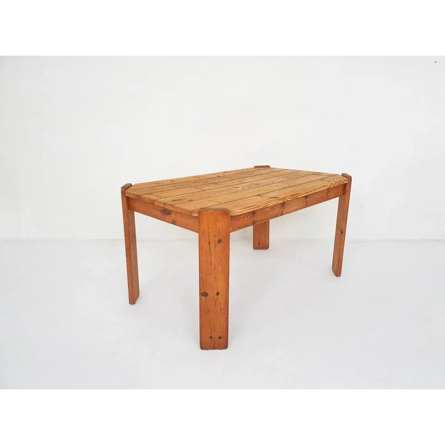 Dining table in pinewood, attributed to Ate van Apeldoorn. The top has been sand and oiled. The legs can be removed for...