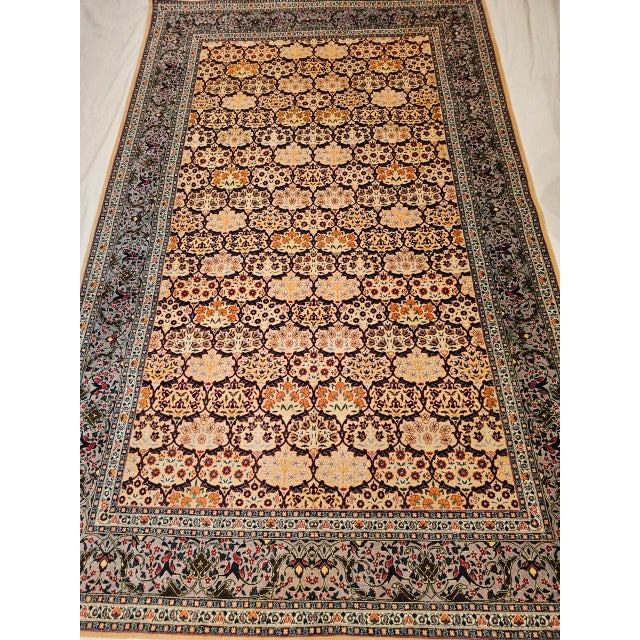 This vintage Turkish Hereke room-size rug features a finely woven allover geometric pattern of great visual richness, set...