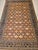 This vintage Turkish Hereke room-size rug features a finely woven allover geometric pattern of great visual richness, set...