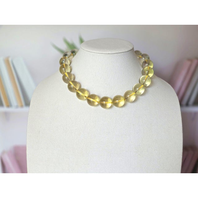 The necklace is 18 inches (45.7 cm) long, and the smooth round beads are 20 mm in size. The beads are a beautiful, bright...