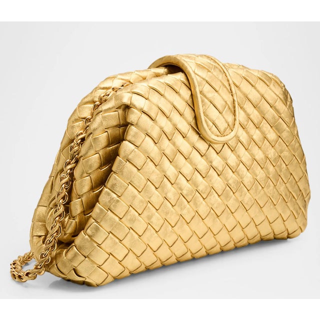 Bottega Veneta Lauren 1980 Gold Laminated Bag Inspired by an archival design, Lauren 1980 reinterprets the classic clutch...