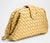 Bottega Veneta Lauren 1980 Gold Laminated Bag Inspired by an archival design, Lauren 1980 reinterprets the classic clutch...