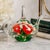A striking example of American studio glass artistry, this miniature teapot by Joe St. Clair showcases the brand’s...