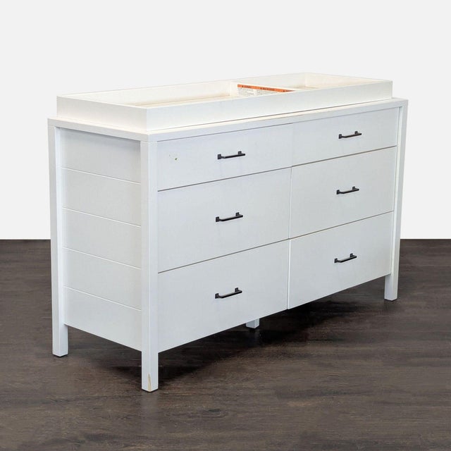This Pottery Barn Kids dresser features six spacious drawers for plenty of storage. The white finish and simple handles...