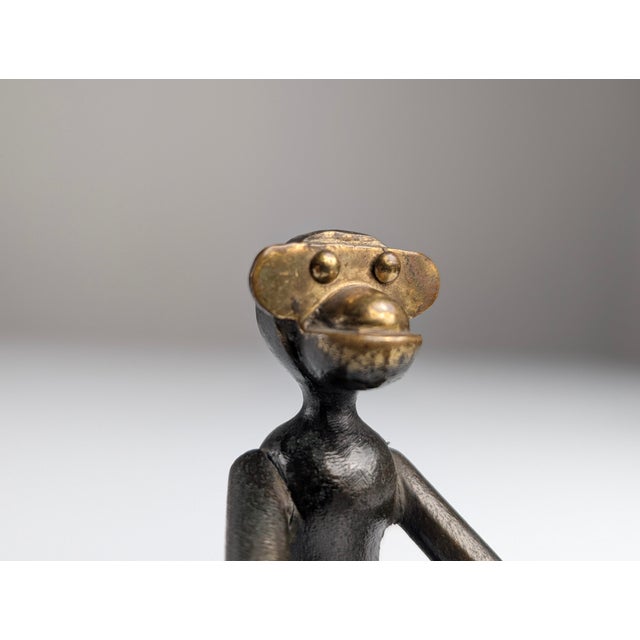 This exceptional and rare monkey sculpture is made of patinated and partially polished bronze, attributed to the renowned...