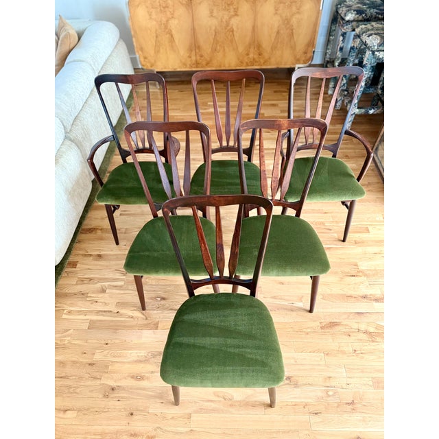 A stunning set of Danish rosewood dining chairs, c.1960s. Designed by Niels Koefoed, this "Ingrid" dining chair set is...