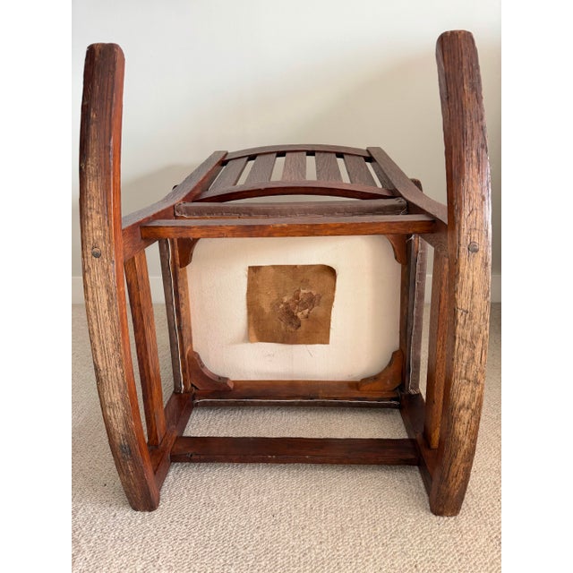 Iconic Gustav Stickley Craftsman V-back oak rocking chair. Top V-slat is quarter-sawn oak, as well as the four square...