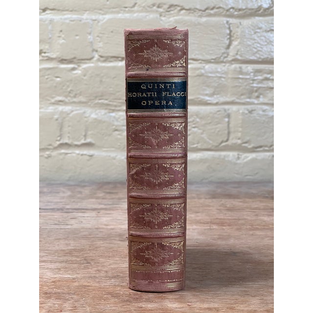 A magnificent antique edition of The Works of Quintus Horatius Flaccus, celebrating the enduring literary legacy of...