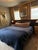 Custom Wall to Wall Velvet Headboard and Walnut King Sized Bed Frame For Sale - Image 4 of 5