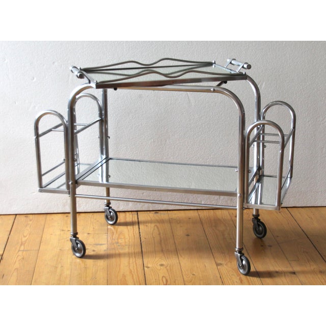 This modernist bar cart/trolley looks like the one designed by Art Deco designer and architect Robert Mallet-Stevens....
