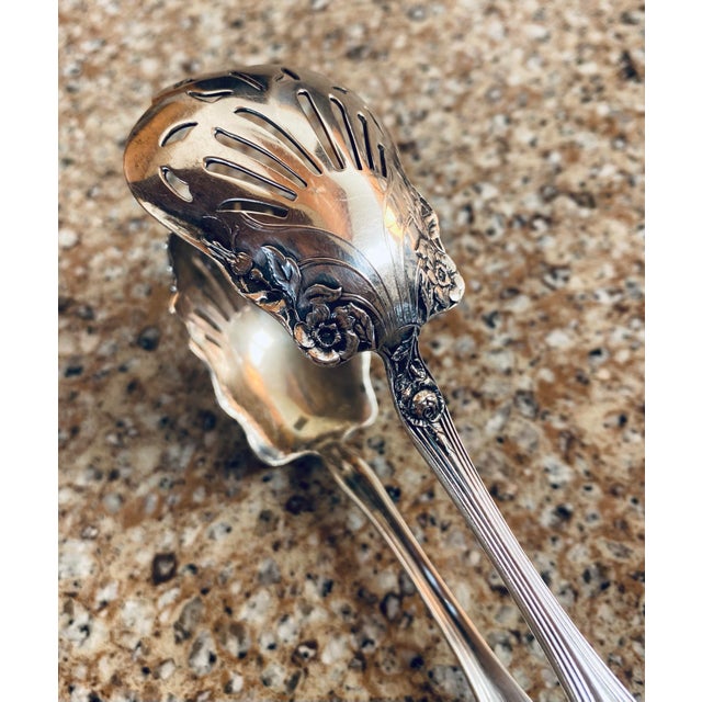 Antique sterling silver tongs made c. 1900 by Watson & Newell of Massachusetts (known as Watson & Co.) in the “Wedding...