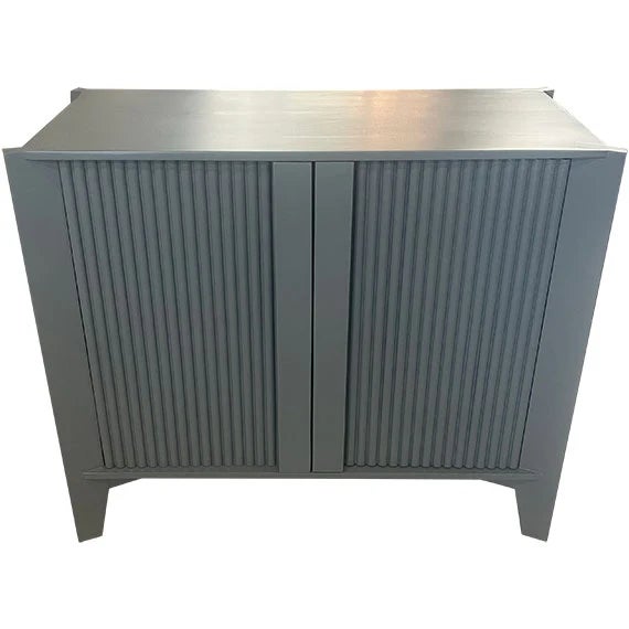 Vintage two-door cabinet with fluted door fronts and a painted charcoal finish. The clean-lined silhouette and textured...