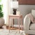 Enhance your home with the Paislynn Accent Table in a tranquil pink color. This elegant table features a versatile design...