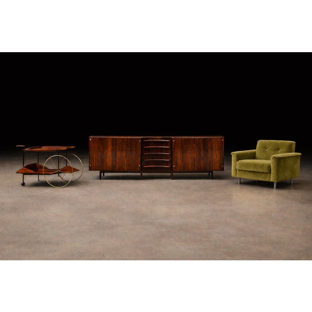 Designed in the 1960s by Jean Gillon, this exceptional credenza represents a rare private commission executed at the...