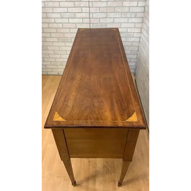 Antique Federal/Hepplewhite Style Mahogany Inlaid Spade Foot Sideboard This elegant Federal style mahogany sideboard...