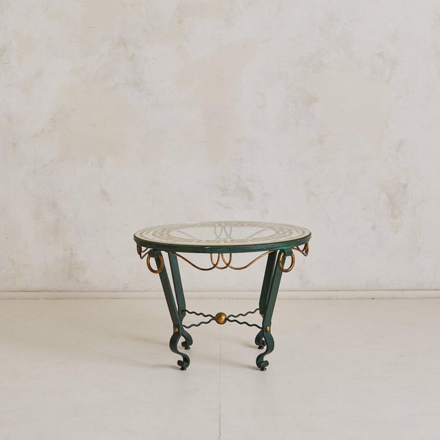 An elegant study in French modern‑neoclassicism, this petite guéridon—attributed to Maison Ramsay and dating to the late...