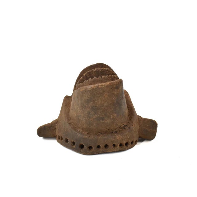 A Ngwaka Mask with angular features, circular eyes, and an elongated mouth.Â Ngwaka traditional African masks are integral...
