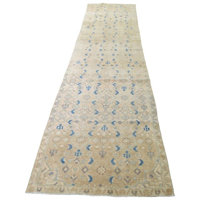 Hand-knotted with care using traditional rug-making techniques, this wool rug blends timeless craftsmanship with a modern...