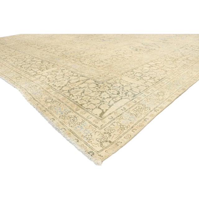 76607 Distressed Antique Persian Tabriz Rug, 11'02 x 13'05. Cozy Cotswolds meets rustic luxe in this hand knotted wool...