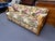 Contemporary Lane Venture rattan floral sunroom sofa. It seats three and the upholstery is original. Excellent vintage...