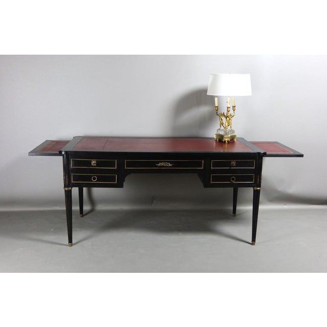 Louis XVI style painted wooden desk on oak frame. This desk is equipped with two side zippers and has two drawers on the...