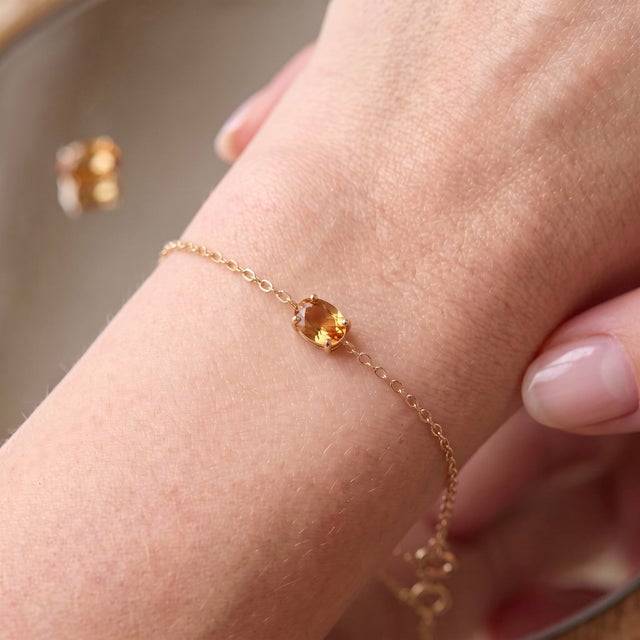 Elevate your everyday elegance with this minimalist East-West gemstone bracelet, designed to showcase understated luxury...