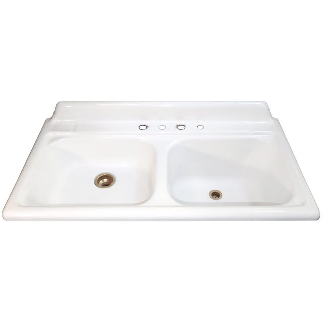 This sink is in good condition for its 69 years with very white porcelain, and it looks nice from all angles. There is...