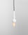 With a seductive gloss, this ceramic pendant lamp boasts a sleek turned shape punctuated by its impeccable white glaze....