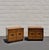 A pair of 1970s vintage campaign nightstands in patina brass and wood veneer. Nightstands are in good condition and...