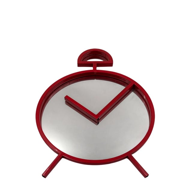 Postmodern clock shaped red wall mirror Pop Art Design PILM Italy 1980s metal, glass H 45 cm 32 × 2 cm Conditions:...