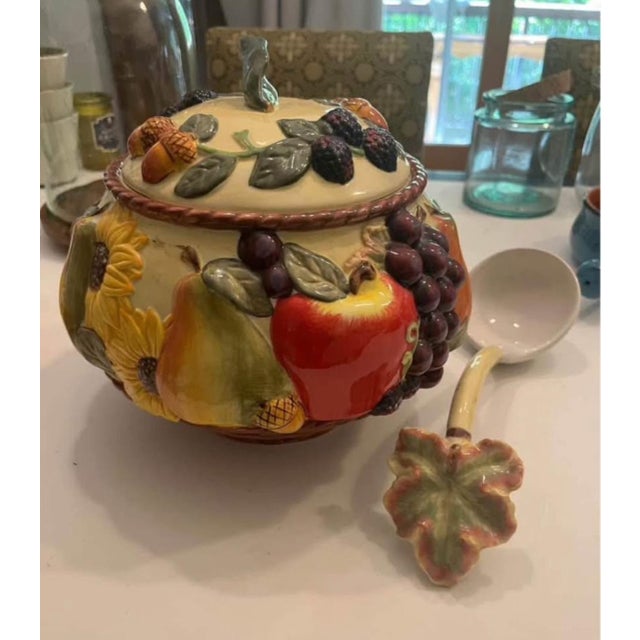 Serve in style with this Burton & Burton ceramic soup tureen, complete with matching lid and leaf-handled ladle. Decorated...