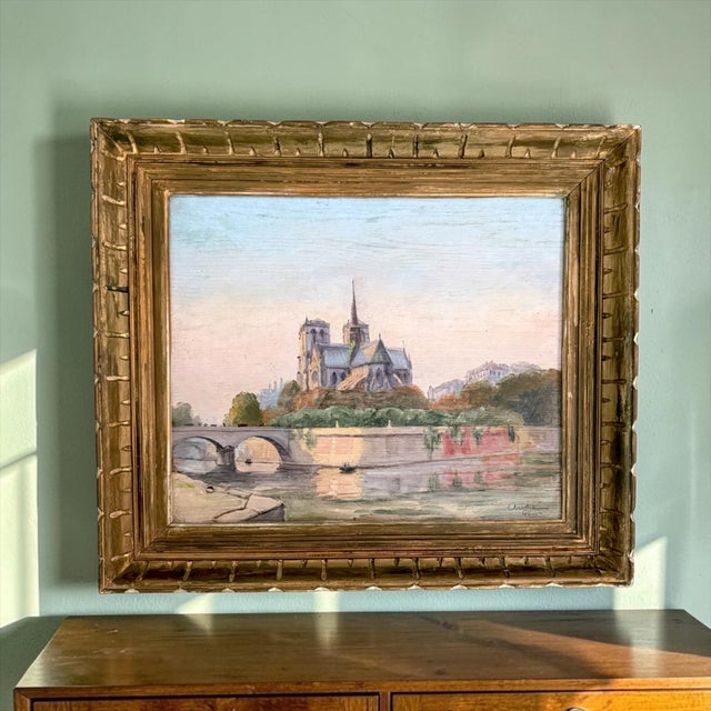 Few landmarks capture the romance of Paris quite like Notre-Dame, and this charming 1946 oil painting beautifully evokes...