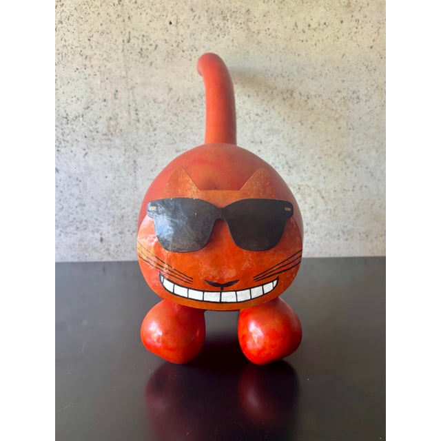 Whimsical vintage 1990s California folk art cat sculpture, handmade from natural gourds and finished in a vibrant red-...