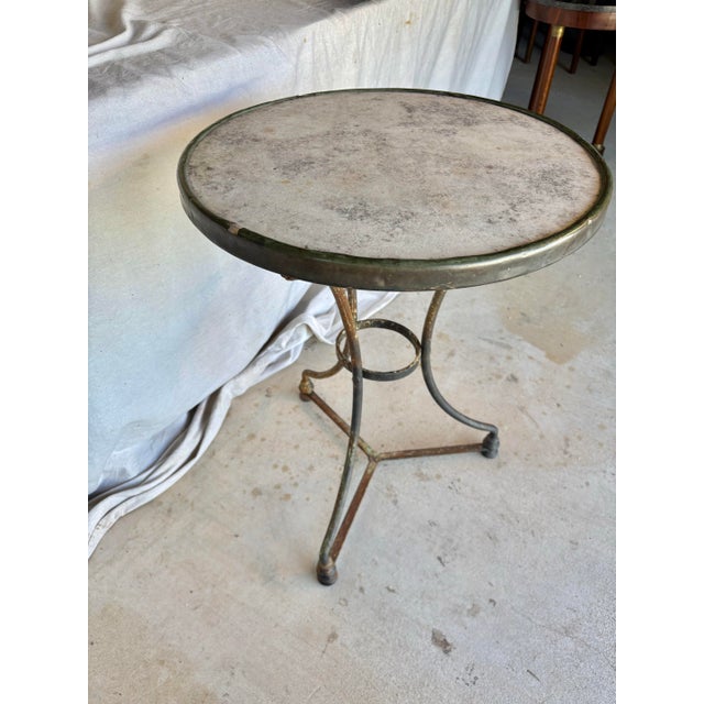 Found in the South of France, this Late 19th Century French Iron and Stone Bistro Garden Table dates back to the late...