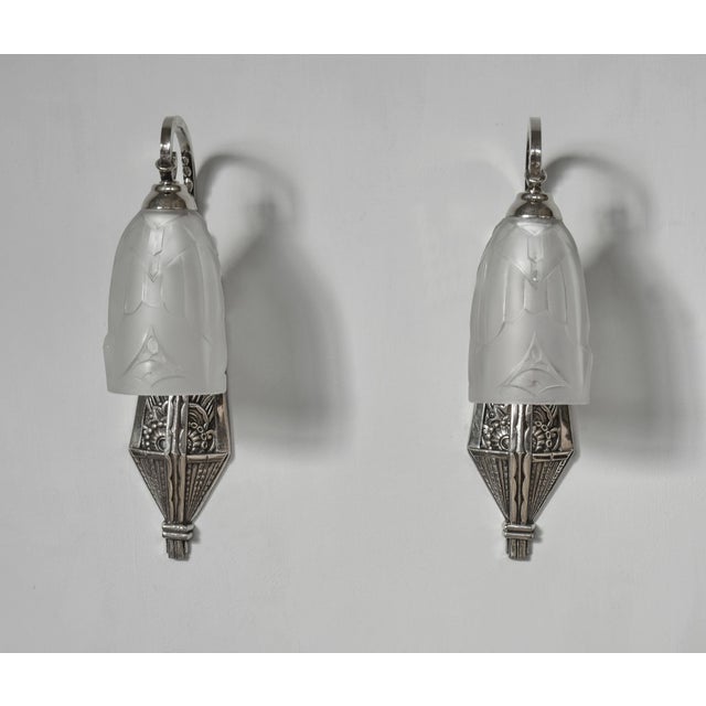 Léon Hugue A wonderful pair of French 1930 art deco wall sconces made by the Paris based company of Léon Hugue, Nickel...